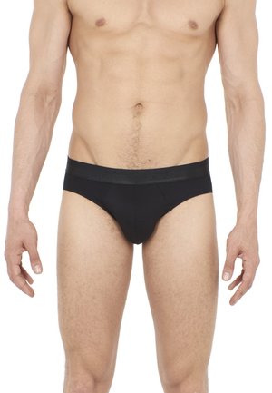 Sorte bomulds herreboxershorts med en glat elastisk bæltelinje. Designet har en tætsiddende pasform og en klassisk boksershort-form.