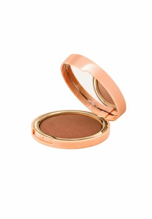 Compact makeup powder in a round peach-colored case with a built-in mirror, showing medium brown pressed powder inside.