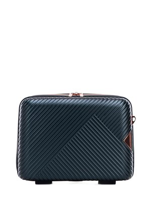 Dark green textured carry bag with diagonal ridges, bronze hardware, rectangular shape, and a small accent triangle on the side.