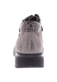 Gray suede sneaker with black patterned collar and black rubber sole, photographed from the back on a white background.