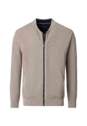 Beige knit cardigan with a zip front, ribbed cuffs, and hem. Features side pockets and a textured pattern throughout the fabric.