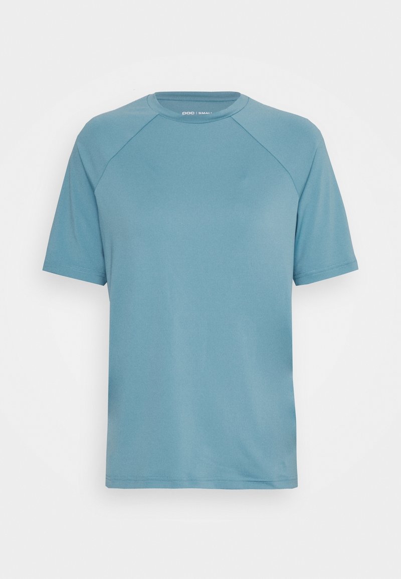 Niebieska koszulka z krótkim rękawem wykonana z gładkiej, lekkiej tkaniny. Posiada okrągły dekolt i raglanowy krój rękawów, z minimalnymi przeszyciami.