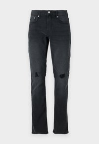 Svart denim jeans med slim fit, diskret slitasje, to hull på knærne og tradisjonell femlommestil med knappelukking.