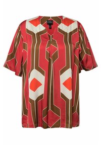 Rote Bluse mit geometrischem Muster in Braun, Weiß und Orange. Kurzärmlig, mit V-Ausschnitt und aus leichtem Stoff.