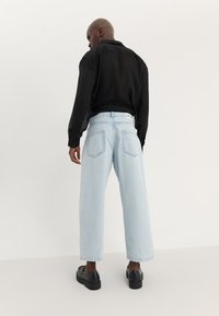 YOURTURN UNISEX - Džínsy široké - bleached denim