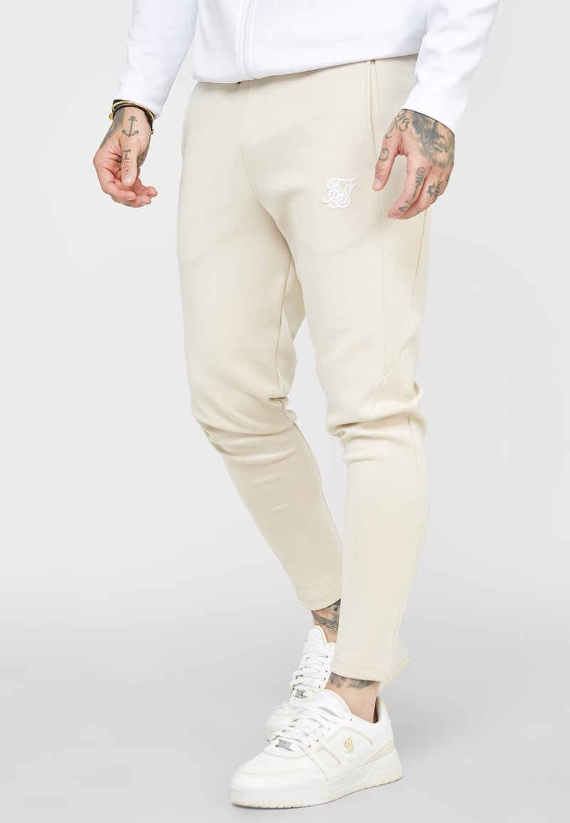 SIKSILK - TAPED PANT - Donji dijelovi trenirke - stone/white, Povećaj