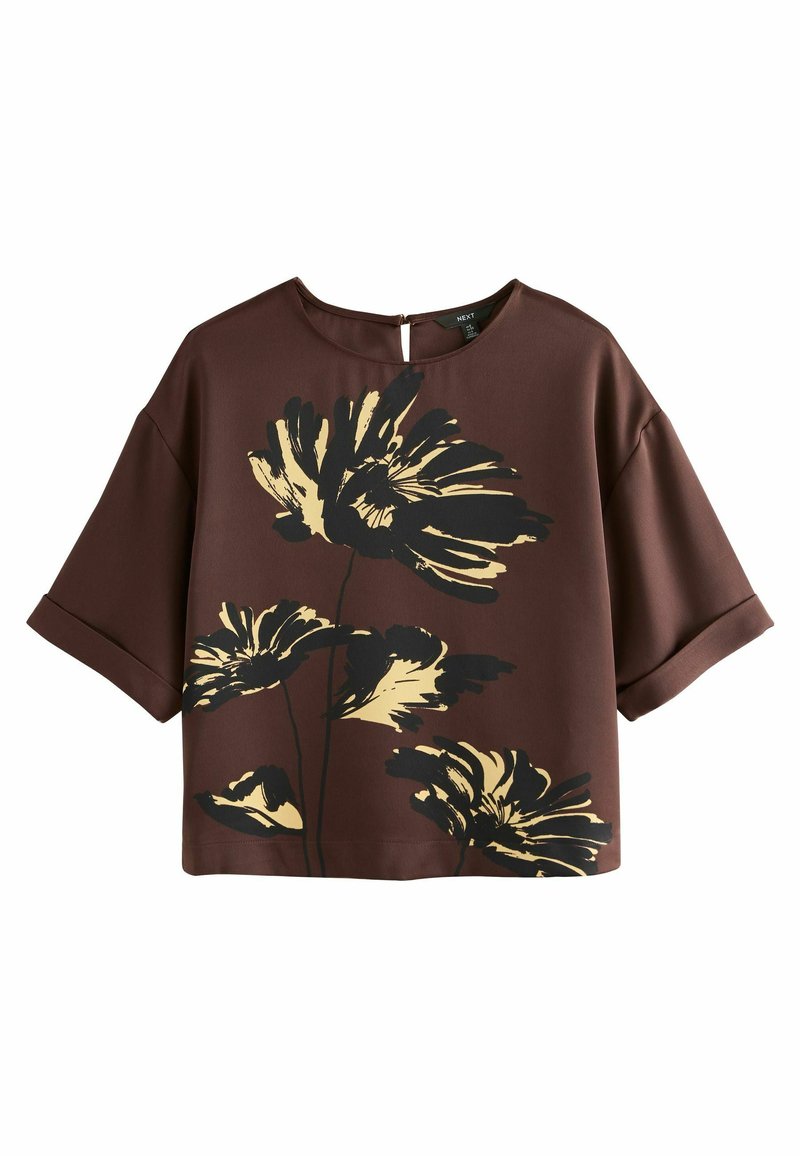 Braunes Kurzarmshirt mit floralen Motiven, das große gelbe und schwarze Blumenmuster zeigt, einen runden Ausschnitt hat und über eine Schlüsselöffnung auf der Rückseite verfügt.