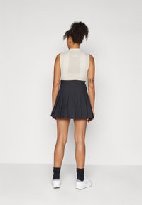 J.LINDEBERG Sports ADINA SKIRT - Sportszoknya - black