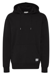 Sudadera negra de felpa suave con un gran bolsillo frontal, cordones ajustables y dobladillo y puños acanalados. Detalle de etiqueta blanca.
