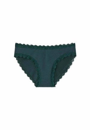 Sous-vêtement féminin style bikini vert foncé avec une bordure en dentelle festonnée le long de la ceinture et des ouvertures des jambes.