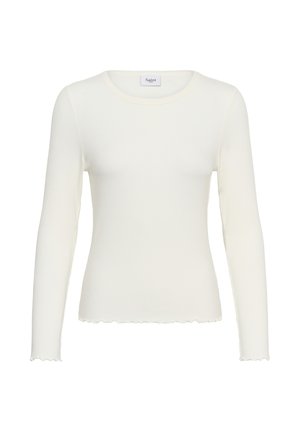 Weißes Langarmoberteil aus geripptem Stoff. Verfügt über einen runden Ausschnitt und einen wellenförmigen Saum. Minimalistisches Design mit figurbetonter Silhouette.