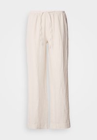 Pantalon en lin crème à coupe ample avec taille élastique et cordon, jambes droites, sans poches visibles ni motifs.