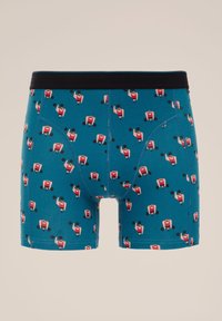 Modré boxerky s potiskem karikatur válečníků v červené a černé barvě, s černým elastickým pasem a měkkou, elastickou tkaninou.