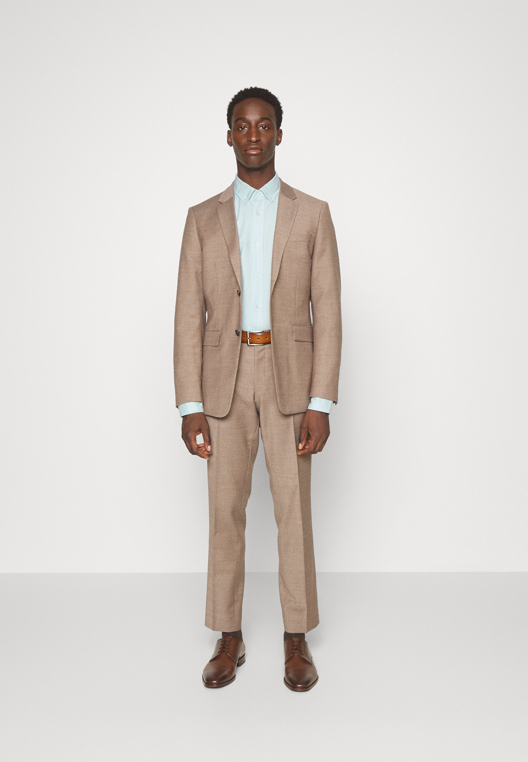 turquoise shirt khaki pants