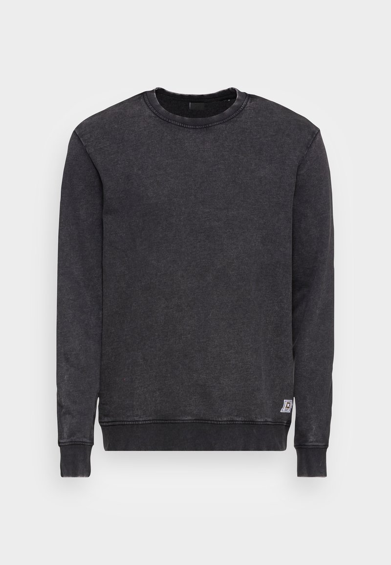 Black crew-neck sweatshirt with long sleeves, ribbed cuffs, and bottom hem. Soft texture with a small logo patch on the lower side.