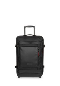 Black rolling suitcase with a hard-shell design, top handle, and extended handle. Features a front zip pocket and red zipper pulls.