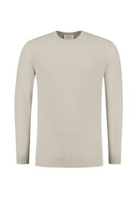 Lichtbeige gebreide trui met lange mouwen, ribbelstructuur en een ronde hals. Kenmerkt zich door een aansluitende zoom en manchetten voor een snug fit.