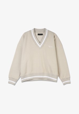 Beež V-kaelusega dressipluus valgete triipudega krael ja allääres. Valmistatud pehmest materjalist, omab avatud lõiget ning esiküljel on brodeeritud logo.