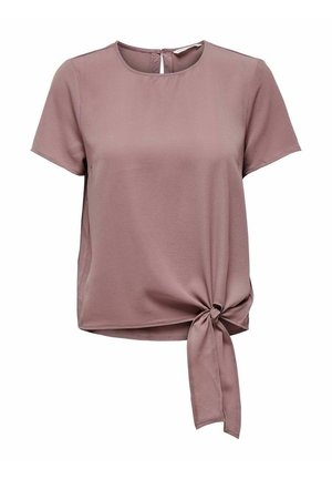 Blouse mauve manches courtes avec encolure ronde et détail de nœud sur le côté avant en tissu texturé, fermeture par boutons au dos.