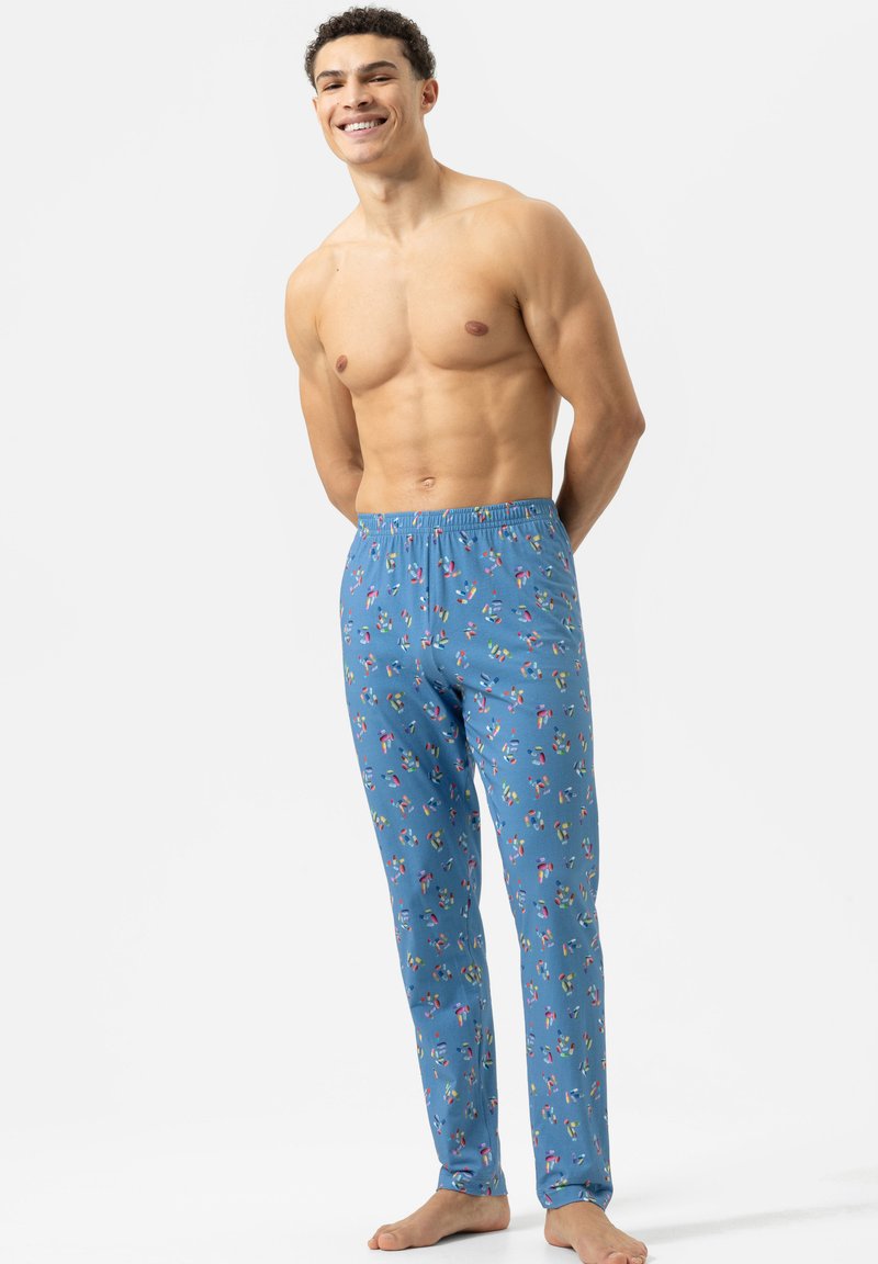 Blauwe pyjamabroek met een bloemenpatroon, uitgerust met een elastische tailleband en een taps toelopende pasvorm. Gladde stof met een zachte textuur.