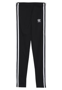 Black leggings made of stretchy material with white side stripes and an Adidas logo on the left thigh. Smooth texture, fitted design.
