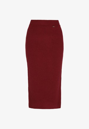 Sügisene midi seelik sügavas punases toonis, ribakujulise tekstuuriga, millel on mugav ja istuv vöökoht ning kerge venivus. Küljel on peen logo detail.