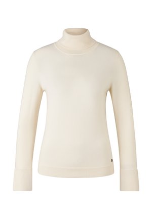 Cream-colored long-sleeve turtleneck sweater with ribbed cuffs and hem, and a small black tag near the bottom edge.