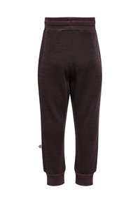 Bruna joggarbyxor i mjukt material, med ribbad midja och muddar, en något texturerad yta och en liten logotypdetalj.