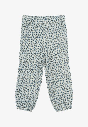 Baltas bikses ar zilu ziedu rakstu, elastīga josta viduklī un pleķaini iešūtas potītēs. Vieglas materiāls un brīvs piegriezums.