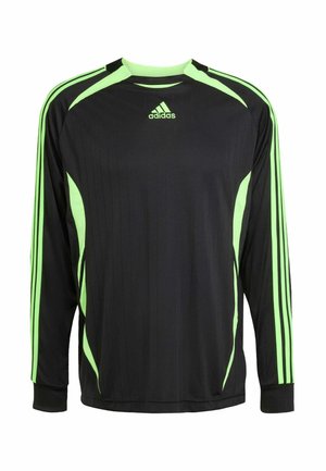 Juodas ilgomis rankovėmis Adidas sportinis marškinėliai su neoninės žalios spalvos juostelėmis ant rankovių, neoninės žalios spalvos šoninėmis juostomis ir Adidas logotipu krūtinėje.