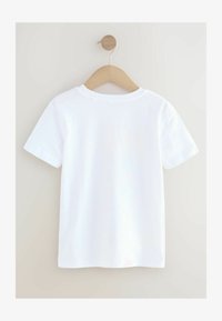 Unselected, white racing car