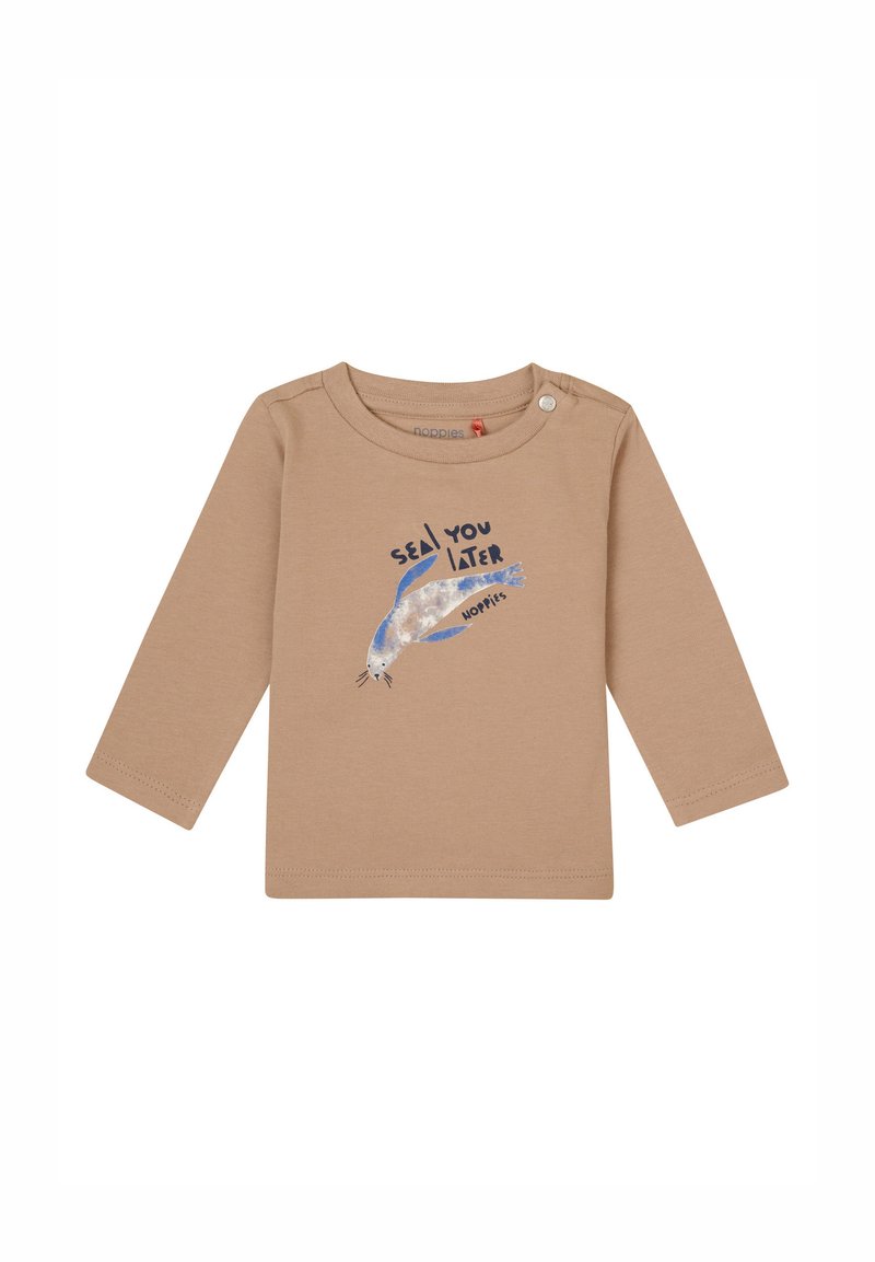 Chemise beige à manches longues ornée d'un motif de phoque bleu et gris avec le texte "À BIENTÔT" en noir, fabriquée en coton doux.