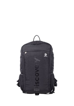 Black Discovery backpack with front zip pocket, mesh side pockets, top handle, and vertical branded logo on the front panel.