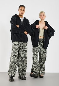 YOURTURN UNISEX - Felpa con zip - schwarz