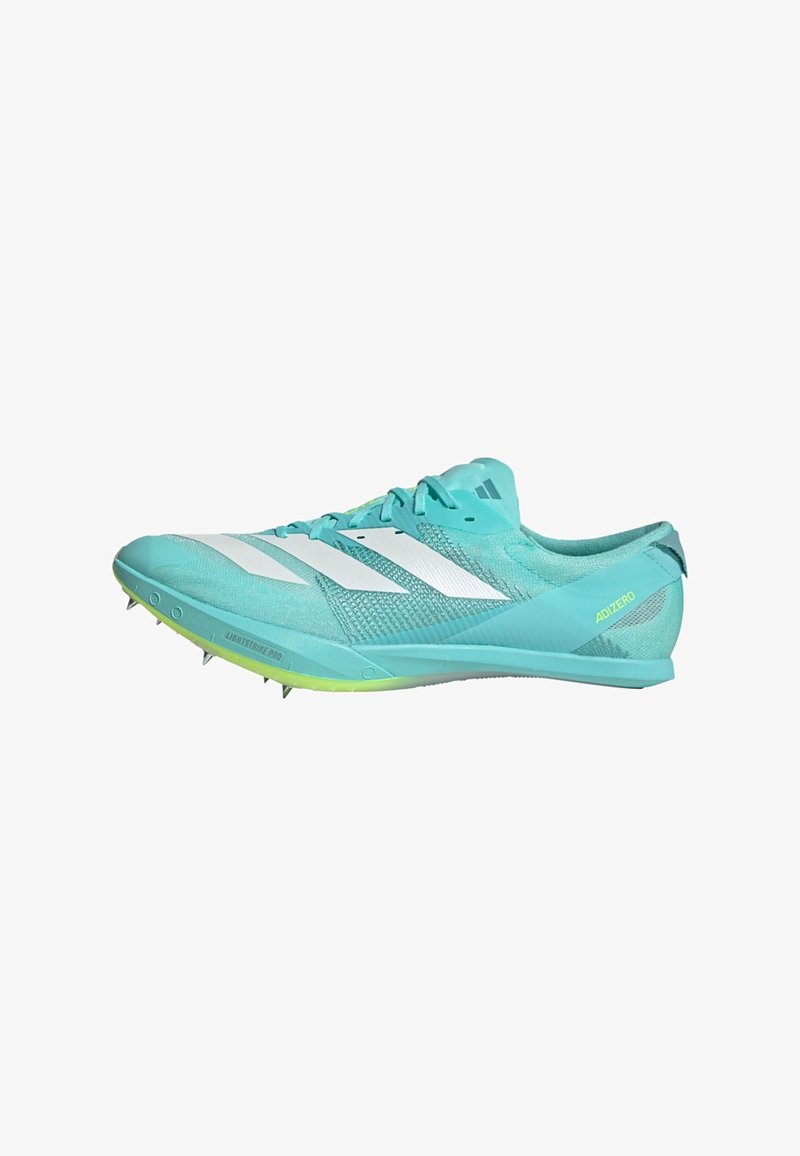 Lightweight turquoise running shoe with white stripes, textured mesh upper, green outsole, and metal spikes for traction.