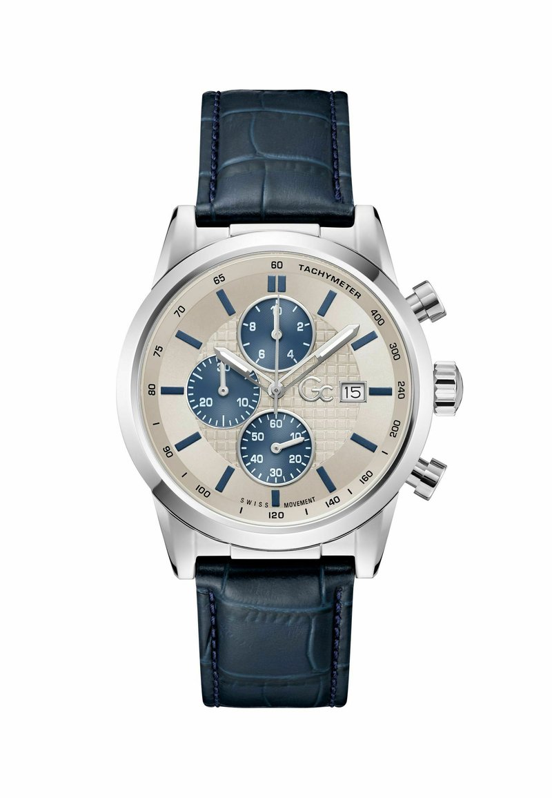 Orologio cronografo con cassa in acciaio inox argentato, quadrante crema con texture, tre sotto-quadranti blu e cinturino in pelle di coccodrillo blu scuro.