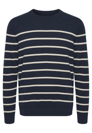 Marinblå stickad tröja med krämfärgade horisontella ränder, rund hals, långa ärmar och ribbade manschetter och nederkant.