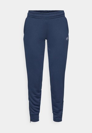 Navy blue jogger pants made of soft fabric, featuring an elastic waistband, side pockets, and zippers at the ankle cuffs for adjustability.