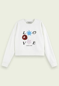 Sudadera corta blanca de manga larga, con un diseño gráfico multicolor de la palabra "AMOR" y formas decorativas en azul, rojo y púrpura.