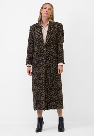 Leopard print long coat in brown and black fabric, featuring a single button closure, long sleeves, and side pockets. Paired with black heeled boots.
