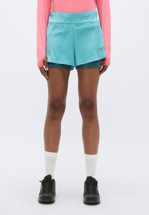 Aqua running shorts with a sleek design, elastic waistband, and inner lining, paired with black athletic shoes and white crew socks.