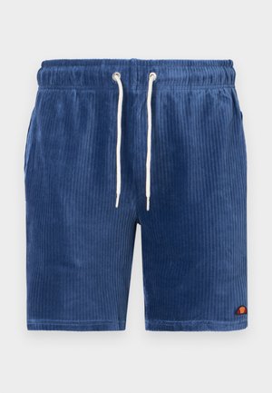 Granatowe szorty z kanałowym materiałem, z elastyczną talią, białym sznurkiem do regulacji i logo w czerwonym i żółtym kolorze na dolnym brzegu. Pionowy żebrowany materiał.