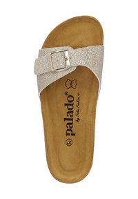 Open-toe sandal in metallic silver material with textured strap. Features a buckle and tan insoles with black branding. Flat sole design.