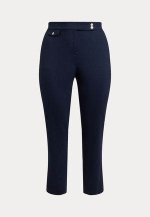 Tmavomodré, priliehavé nohavice vyrobené z elastickej tkaniny. Obsahujú hladký pás s dvomi striebornými gombíkmi a detail v podobe bočnej vrecka.