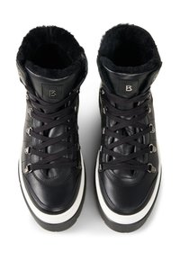Black leather high-top shoes with fur lining, featuring black laces, metal eyelets, and a white rubber sole with textured grip.