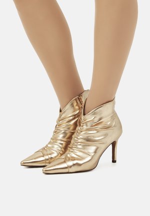 Botines - oro