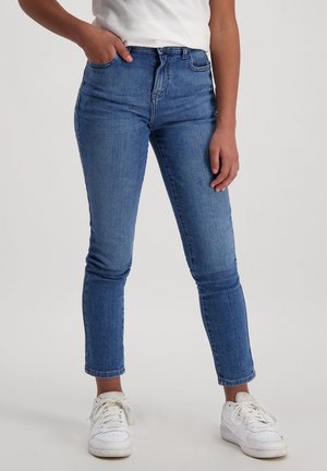 Skinny jeans in middelblauwe denim, hoge taille met een aansluitend ontwerp. Beschikt over subtiele vervaging, cropped lengte en een speciaal gemaakte pasvorm met minimale hardware.