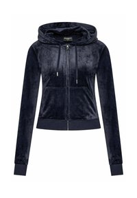 Felpa con zip di colore blu navy realizzata in morbido tessuto in velour. Presenta un cappuccio, due tasche anteriori e un dettaglio con logo sul petto.