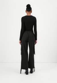 Tommy Jeans ELASTICATED PANT - Cargobukse - black