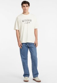Guess Jeans VINTAGE - Marškinėliai su spaudiniu - creme